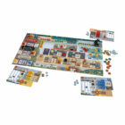 Detalles de tablero, dados y miniaturas del juego The White Castle en mesa.